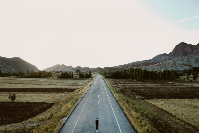 A Person Standing Alone on Country Road (https://www.pexels.com/)